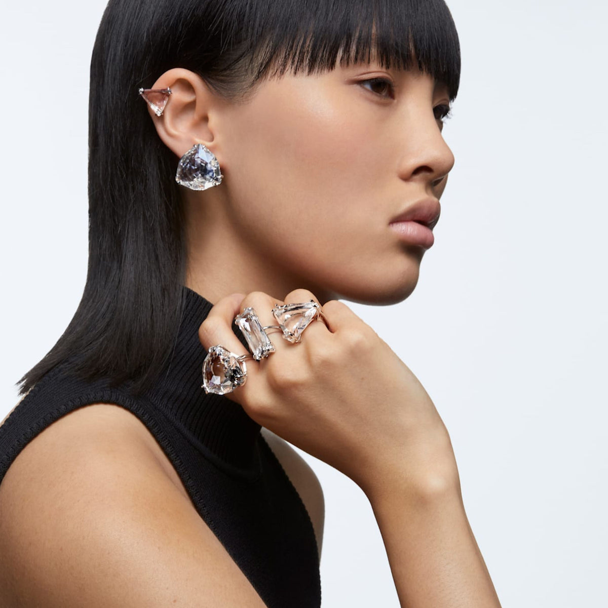 Swarovski Mesmera Trillion Clip Earring - View 2 | Wrights Jewellers NZ