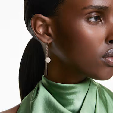 Rose gold thread earrings, worn by a model