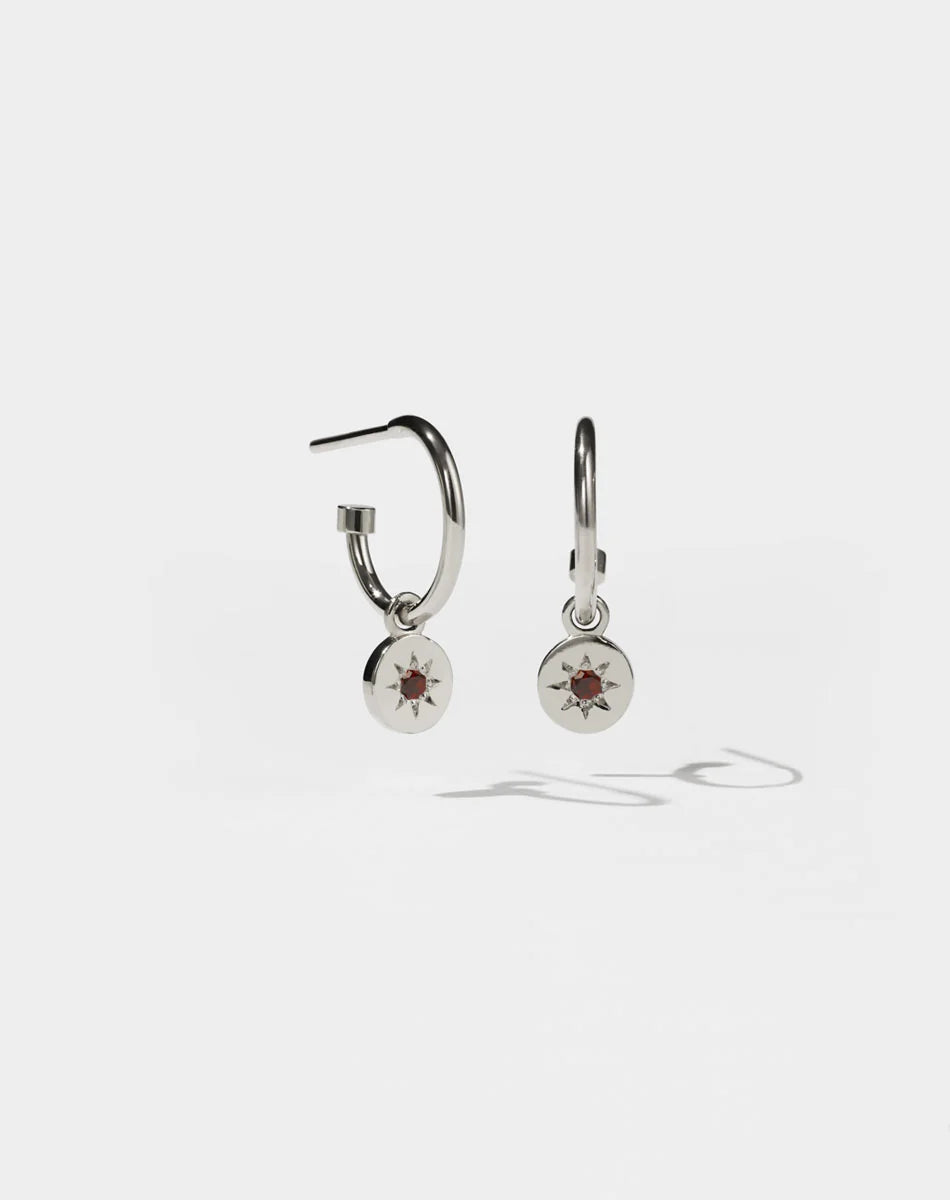 Meadowlark Lulu Signature hoop earring with a garnet charm