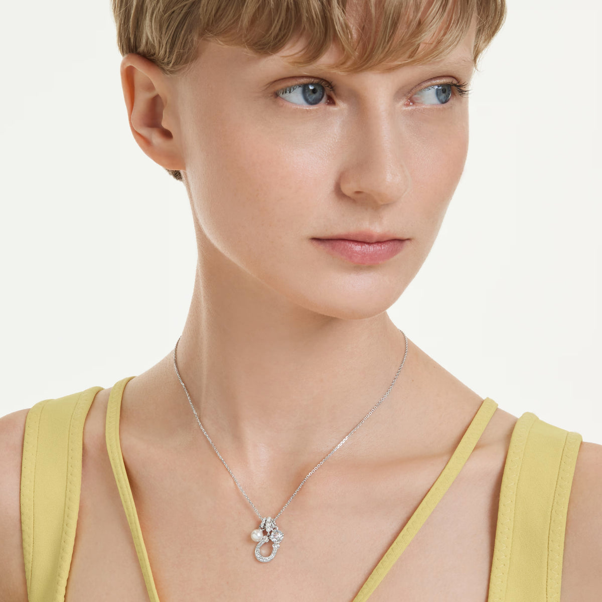 Swarovski Symbolica pendant, rhodium-plated with crystal pearl and horseshoe motif