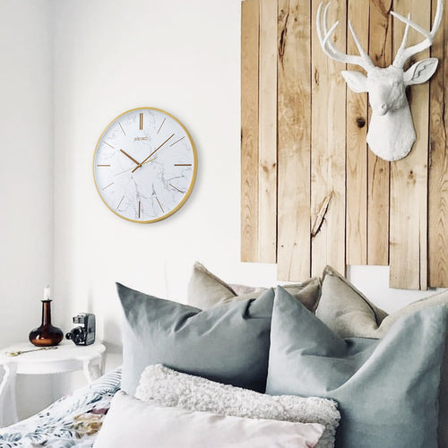 Seiko wall clock shown in a bedroom