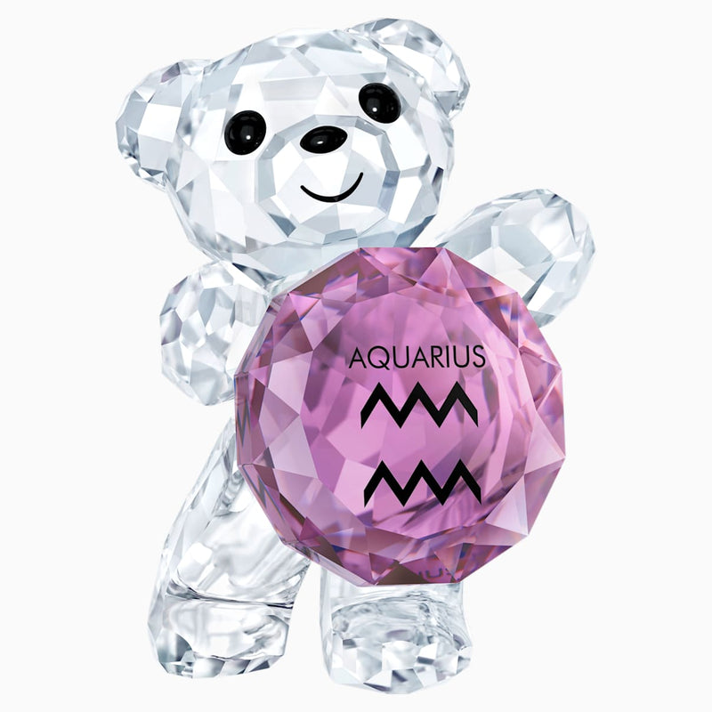 Swarovski Kris Bear holding a purple Aquarius symbol
