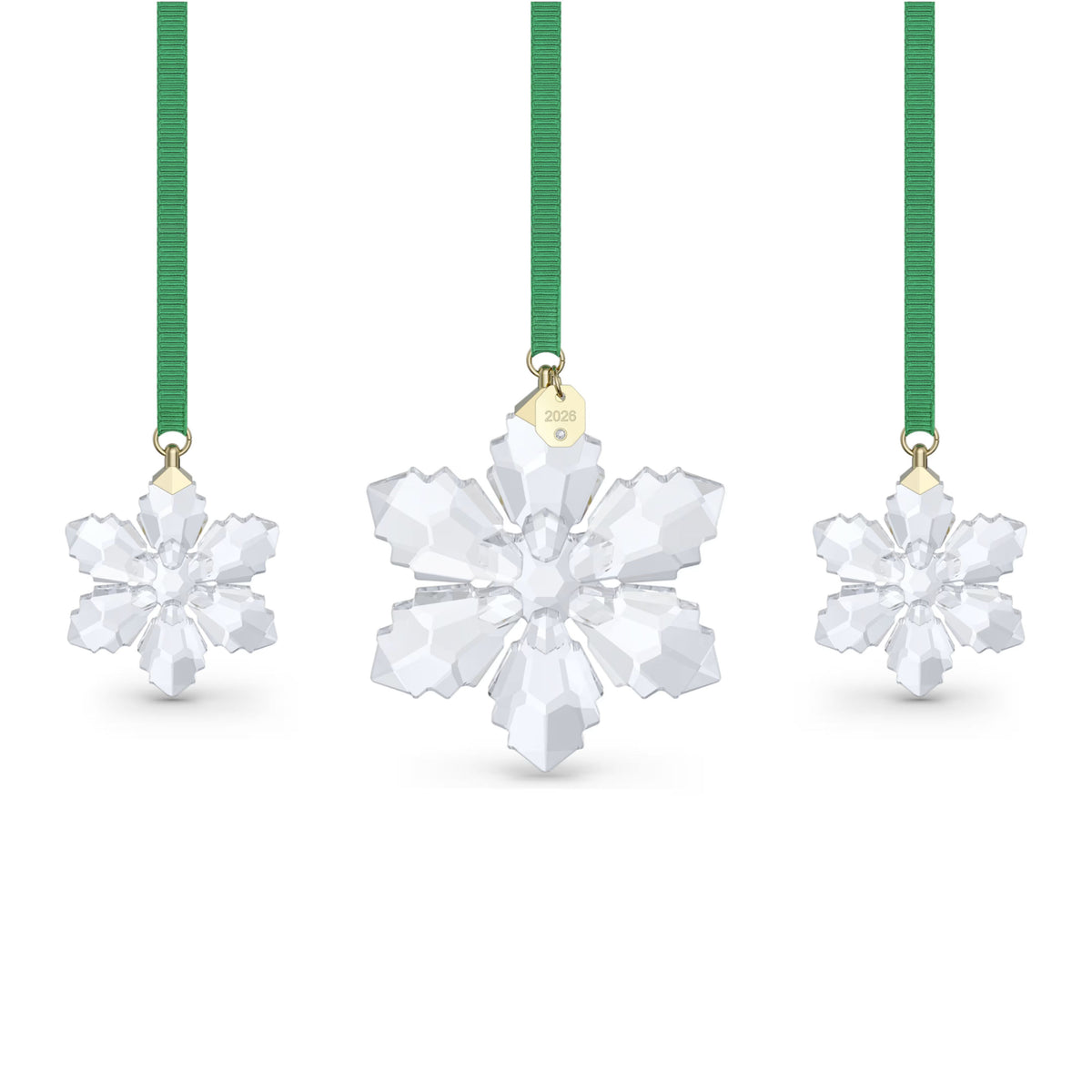 Swarovski Annual Edition 2026 clear crystal snowflake ornament set on green ribbons