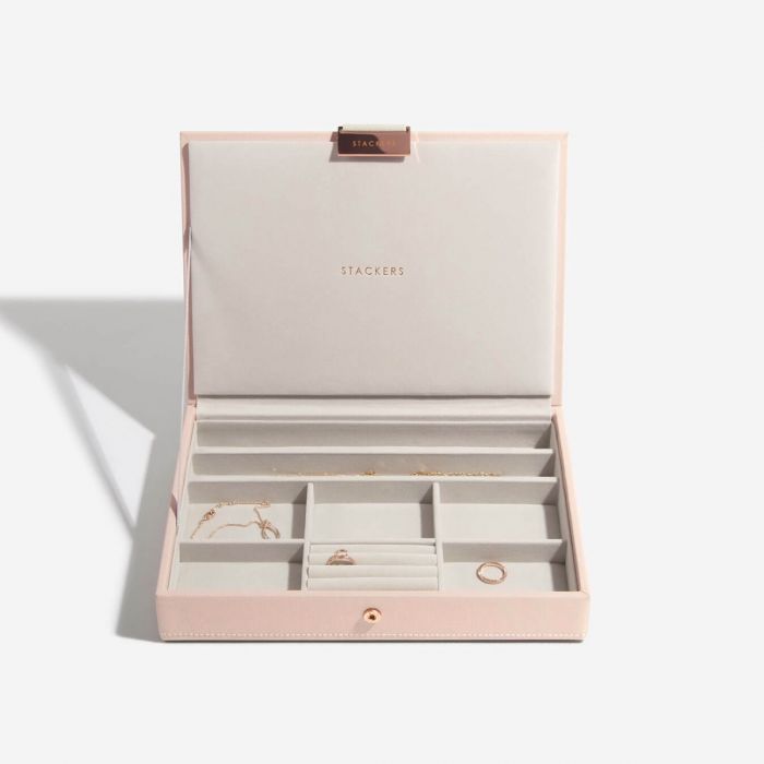 Pink jewellery box with compartments for rings, earrings, and necklaces