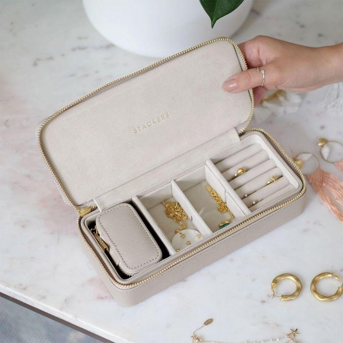 Large taupe grey jewellery box with compartments for rings, earrings, and necklaces