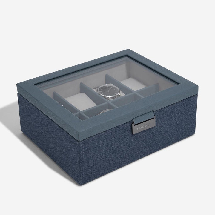 Crafted with a premium faux leather and canvas exterior, this contemporary watch storage box is finished with sleek gunmetal hardware for a stylish, modern look. Perfect as a gift or a personal storage solution, it’s a stand-alone piece designed for durability, elegance, and everyday use. Ideal for anyone wanting a safe, practical, and visually appealing way to store their watches.